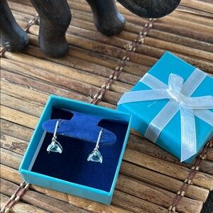 Drop earrings featuring trillion-cut blue gemstones blue topaz and 925 silver